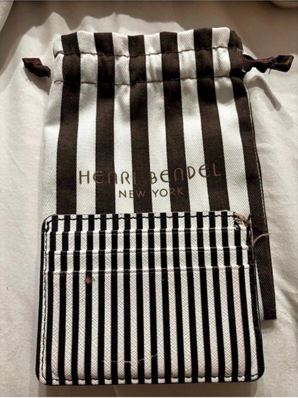 Henri Bendel Striped card holder in Black & White